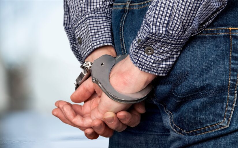 Photo of a Man in Handcuffs Scene